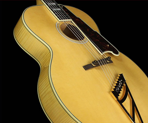 win-a-this-dangelico-ex-63-archtop-acoustic-guitar